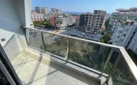 Sunny apartment 50 m² with sea views in a premium complex in Mahmutlar-id-9547-photo-9