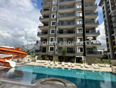 Квартира в современном жилом комплексе со своей большой территорией в районе Махмутлар, укомплектованная новой техникой.-id-9548-фото-2