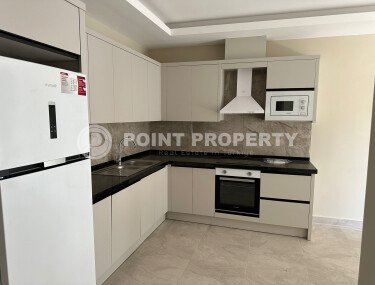 Квартира в современном жилом комплексе со своей большой территорией в районе Махмутлар, укомплектованная новой техникой.-id-9548-фото-3