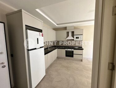 Квартира в современном жилом комплексе со своей большой территорией в районе Махмутлар, укомплектованная новой техникой.-id-9548-фото-4