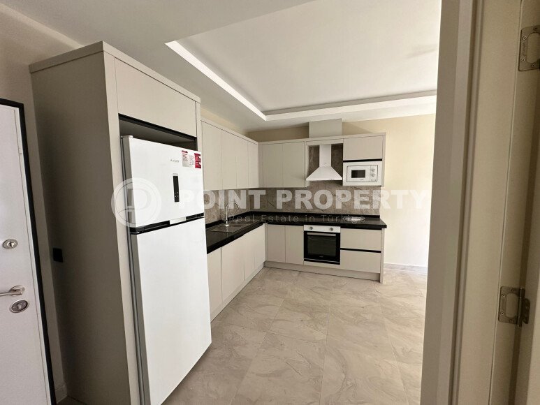 Квартира в современном жилом комплексе со своей большой территорией в районе Махмутлар, укомплектованная новой техникой.-id-9548-фото-4