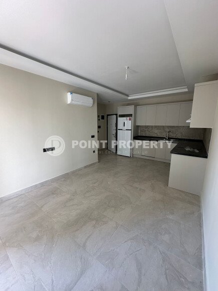 Квартира в современном жилом комплексе со своей большой территорией в районе Махмутлар, укомплектованная новой техникой.-id-9548-фото-5