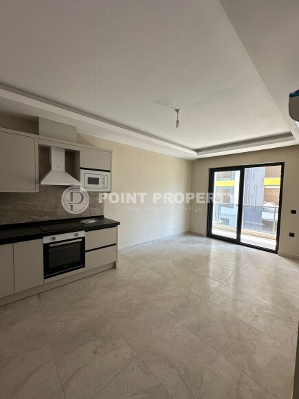 Квартира в современном жилом комплексе со своей большой территорией в районе Махмутлар, укомплектованная новой техникой.-id-9548-фото-7