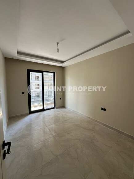 Квартира в современном жилом комплексе со своей большой территорией в районе Махмутлар, укомплектованная новой техникой.-id-9548-фото-8