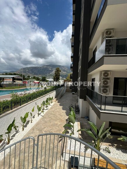 Квартира в современном жилом комплексе со своей большой территорией в районе Махмутлар, укомплектованная новой техникой.-id-9548-фото-15