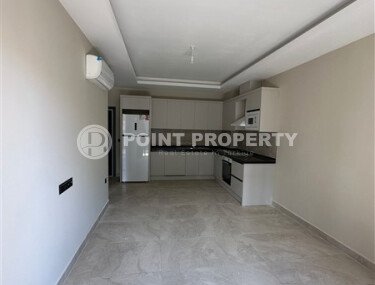 Apartment in a new building with developed infrastructure in the Mahmutlar area, close to the Mediterranean Sea.-id-9549-photo-3