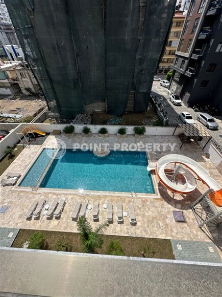 Квартира в новом доме с развитой инфраструктурой в районе Махмутлар, вблизи от средиземного моря.-id-9549-фото-9