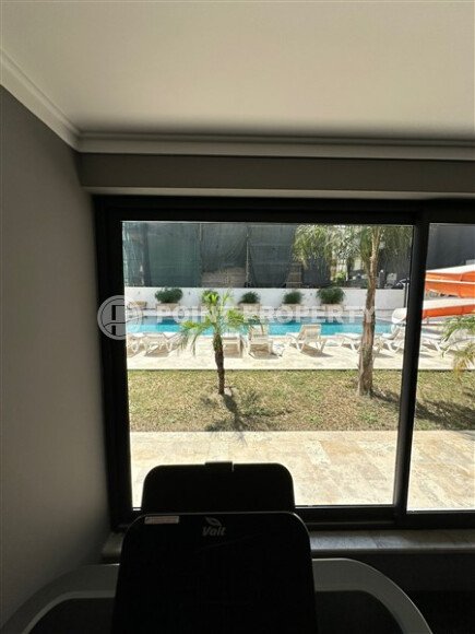 Квартира в новом доме с развитой инфраструктурой в районе Махмутлар, вблизи от средиземного моря.-id-9549-фото-11