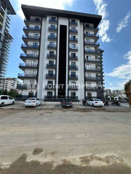 Квартира в новом доме с развитой инфраструктурой в районе Махмутлар, вблизи от средиземного моря.-id-9549-фото-12