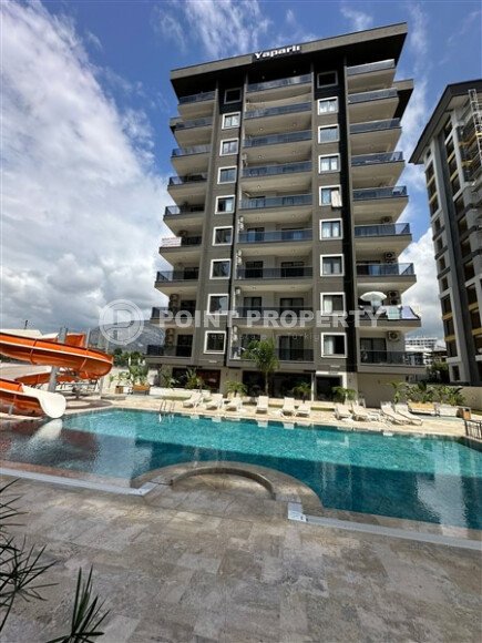 Квартира в новом доме с развитой инфраструктурой в районе Махмутлар, вблизи от средиземного моря.-id-9549-фото-15