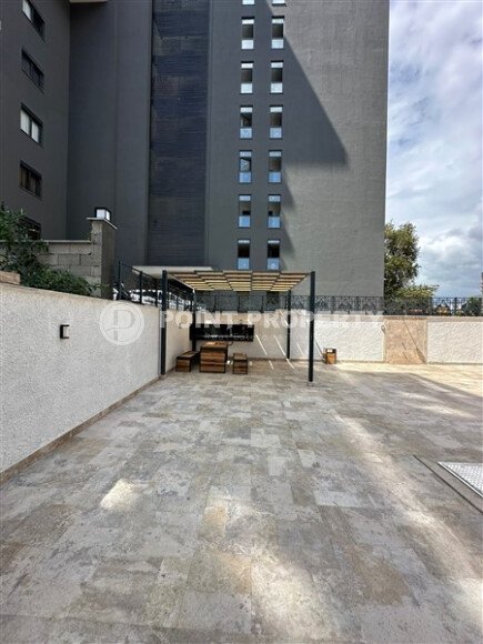 Квартира в новом доме с развитой инфраструктурой в районе Махмутлар, вблизи от средиземного моря.-id-9549-фото-16