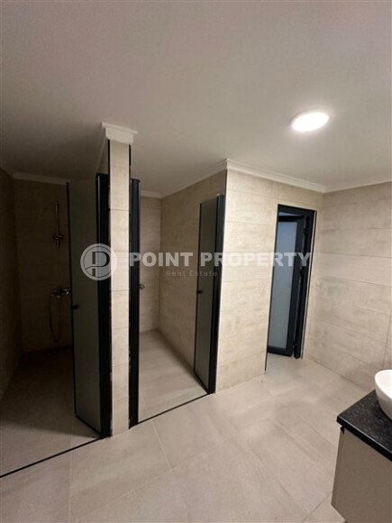 Квартира в новом доме с развитой инфраструктурой в районе Махмутлар, вблизи от средиземного моря.-id-9549-фото-19