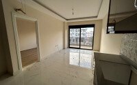 Новая квартира 1+1 площадью 50 м² в районе Оба, Алания-id-9559-фото-2