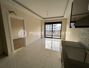 Новая квартира 1+1 площадью 50 м² в районе Оба, Алания-id-9559-фото-2