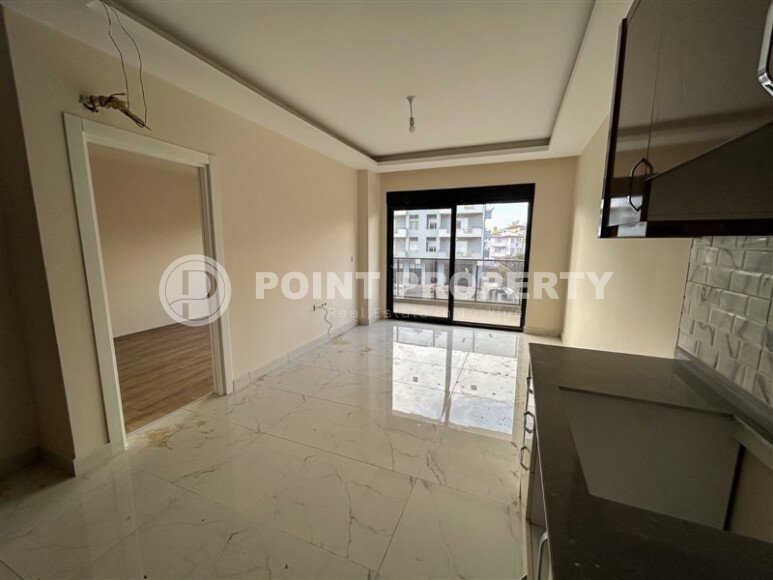 Новая квартира 1+1 площадью 50 м² в районе Оба, Алания-id-9559-фото-2