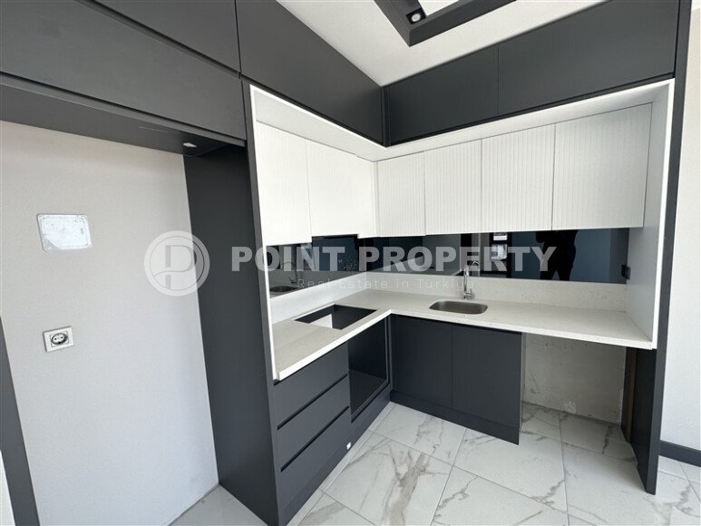 Apartment 2+1 with an area of 67 m² in a modern complex in the Mahmutlar area-id-9562-photo-3