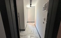 Apartment 2+1 with an area of 67 m² in a modern complex in the Mahmutlar area-id-9562-photo-7