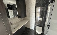 Apartment 2+1 with an area of 67 m² in a modern complex in the Mahmutlar area-id-9562-photo-12