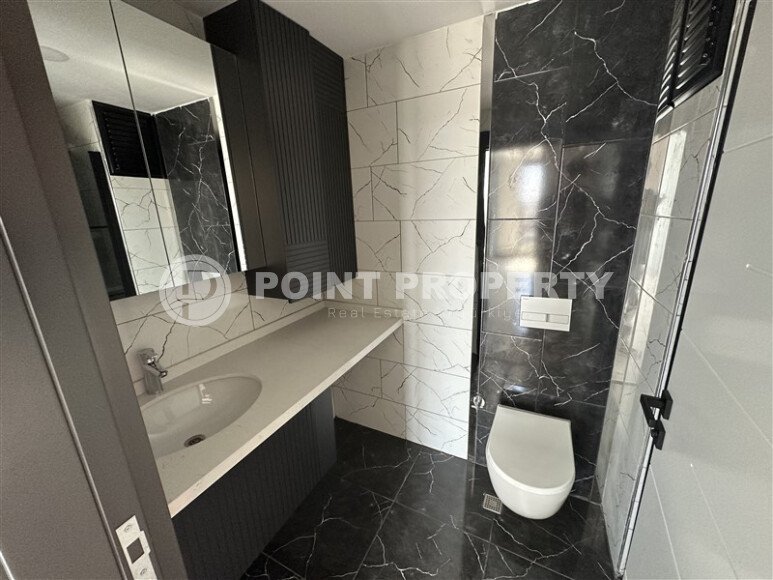Apartment 2+1 with an area of 67 m² in a modern complex in the Mahmutlar area-id-9562-photo-12