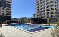 Apartment 2+1 with an area of 67 m² in a modern complex in the Mahmutlar area-id-9562-photo-18