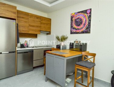 Квартира 1+1 площадью 55 м² с панорамным видом на море в районе Махмутлар-id-9563-фото-1