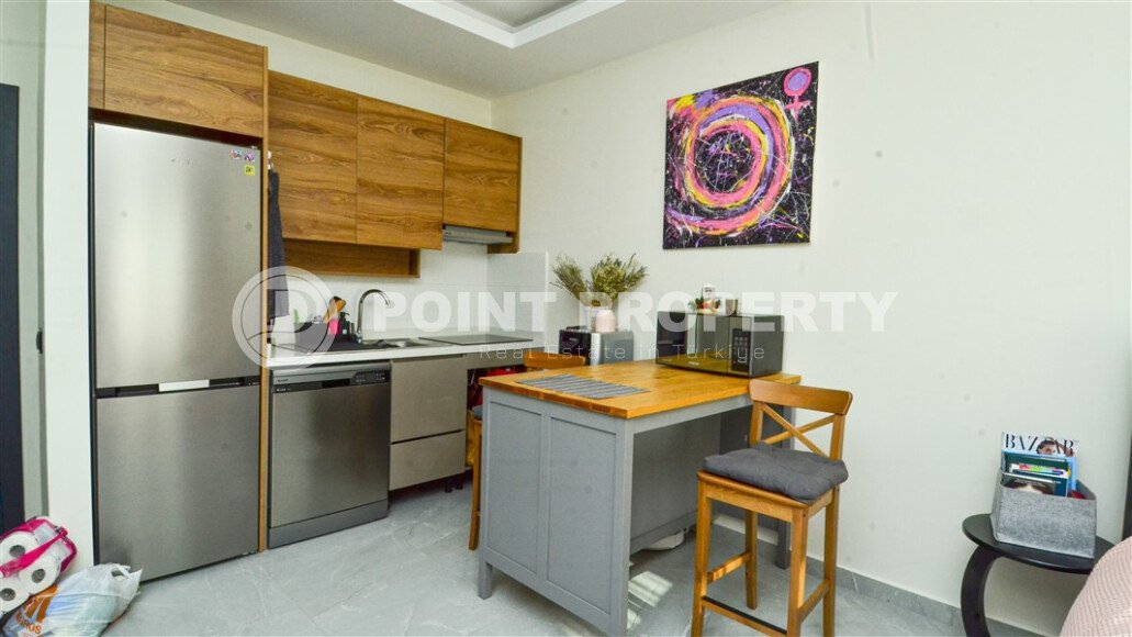 Квартира 1+1 площадью 55 м² с панорамным видом на море в районе Махмутлар-id-9563-фото-1
