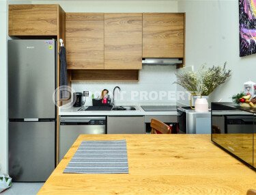 Квартира 1+1 площадью 55 м² с панорамным видом на море в районе Махмутлар-id-9563-фото-2