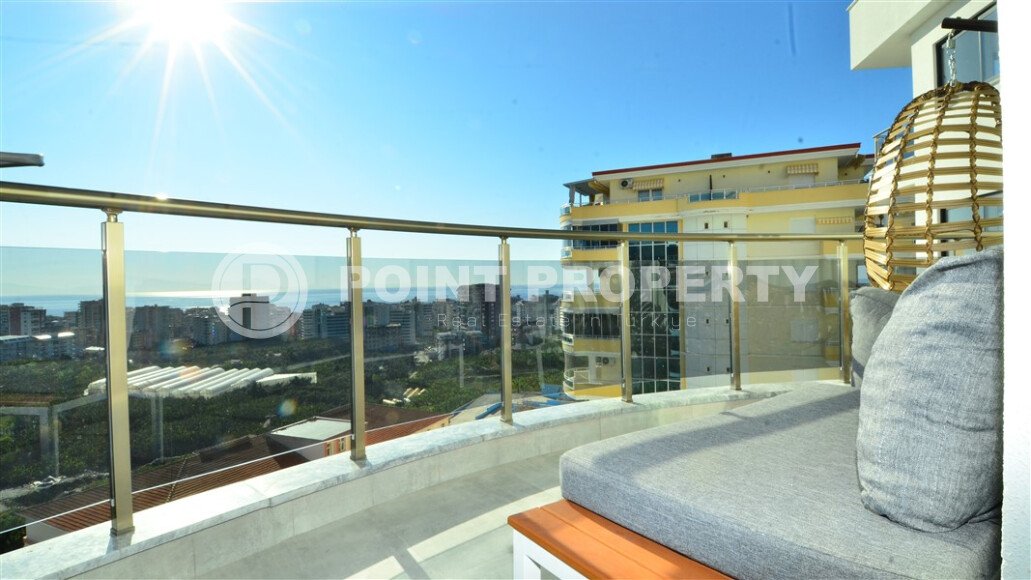 1+1 apartment of 55 m² with panoramic sea view in Mahmutlar-id-9563-photo-4