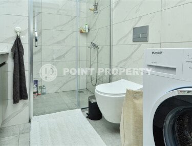 Квартира 1+1 площадью 55 м² с панорамным видом на море в районе Махмутлар-id-9563-фото-5