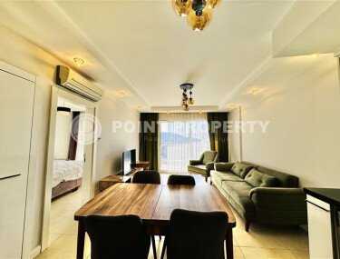 Квартира 1+1 площадью 55 м² с видом на море и горы в престижном районе Джикджилли-id-9571-фото-2