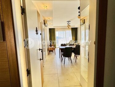 Квартира 1+1 площадью 55 м² с видом на море и горы в престижном районе Джикджилли-id-9571-фото-3