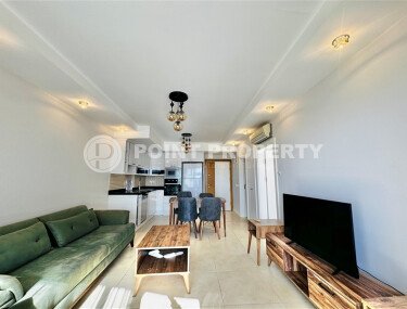 Квартира 1+1 площадью 55 м² с видом на море и горы в престижном районе Джикджилли-id-9571-фото-4