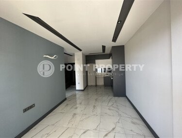 1+1 apartment with an area of 49 m² in a modern residential complex in the Mahmutlar area-id-9574-photo-2