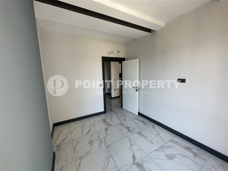 1+1 apartment with an area of 49 m² in a modern residential complex in the Mahmutlar area-id-9574-photo-3