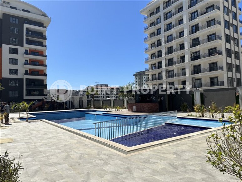 1+1 apartment with an area of 49 m² in a modern residential complex in the Mahmutlar area-id-9574-photo-9