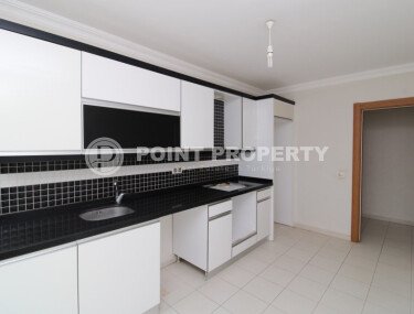 Просторная квартира 2+1 площадью 120 м² с отдельной кухней и двумя балконами в центре Махмутлара-id-9575-фото-2