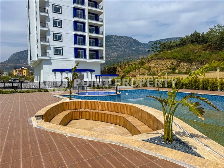 Start of sales of spacious apartments 1+1 and 2+1 duplexes in the center of Mahmutlar, from 54 to 140 m2.-id-1874-photo-1