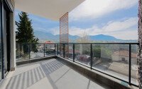 Квартира 1+1, 53 м² в стильном жилом комплексе в верхней части района Оба-id-9580-фото-1