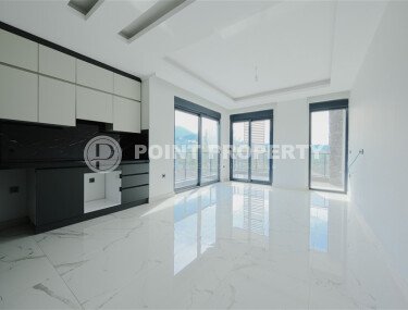 Квартира 1+1, 53 м² в стильном жилом комплексе в верхней части района Оба-id-9580-фото-2