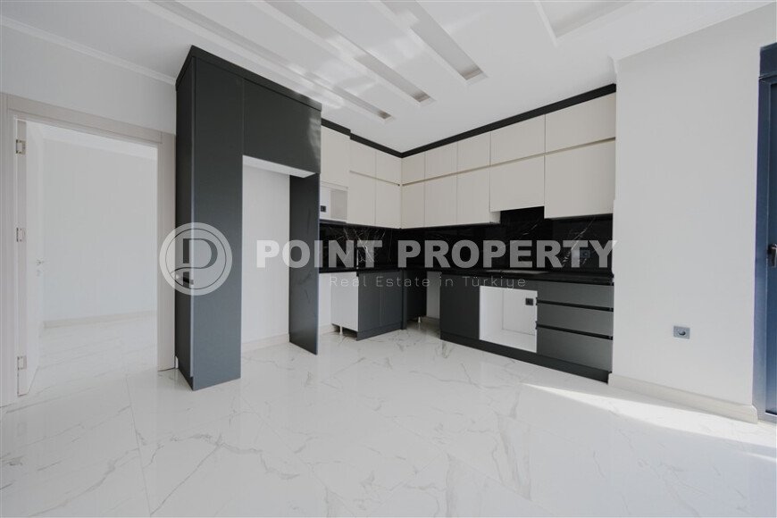 Квартира 1+1, 53 м² в стильном жилом комплексе в верхней части района Оба-id-9580-фото-3