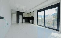 Квартира 1+1, 53 м² в стильном жилом комплексе в верхней части района Оба-id-9580-фото-4
