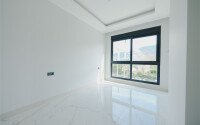 Квартира 1+1, 53 м² в стильном жилом комплексе в верхней части района Оба-id-9580-фото-5