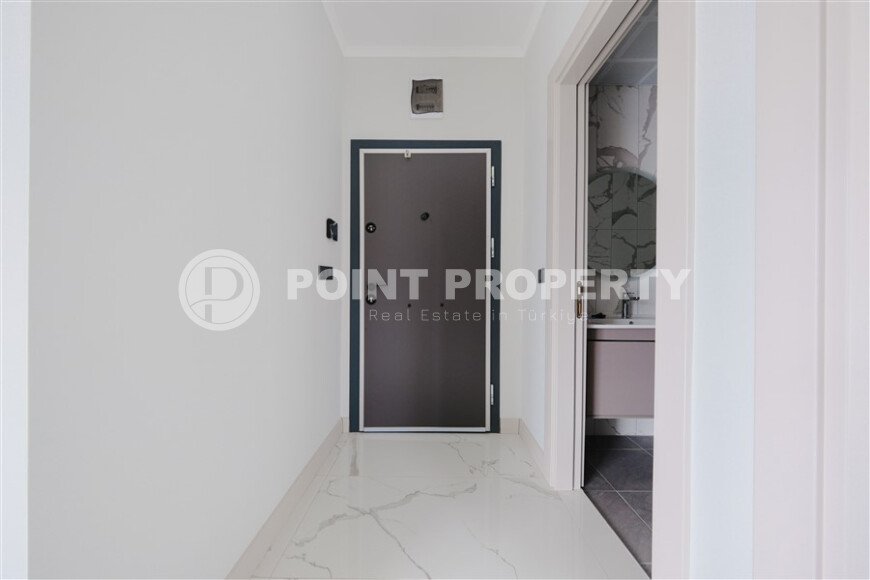 Квартира 1+1, 53 м² в стильном жилом комплексе в верхней части района Оба-id-9580-фото-9