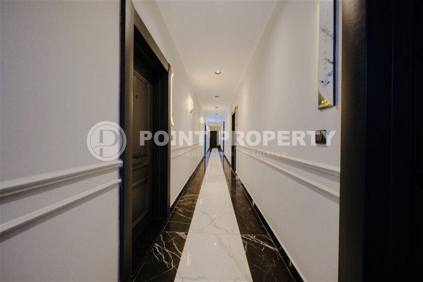 Квартира 1+1, 53 м² в стильном жилом комплексе в верхней части района Оба-id-9580-фото-11
