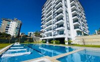 Солнечная квартира 51 м² с садом в районе Авсаллар-id-9595-фото-1