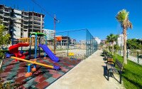 Солнечная квартира 51 м² с садом в районе Авсаллар-id-9595-фото-11