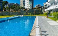 Солнечная квартира 51 м² с садом в районе Авсаллар-id-9595-фото-19