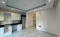 Modern apartment 55 m² in the center of Alanya with panoramic windows in a new complex-id-9597-photo-3