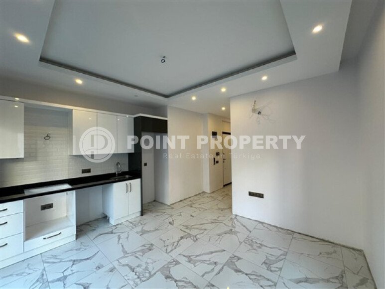 Modern apartment 55 m² in the center of Alanya with panoramic windows in a new complex-id-9597-photo-3