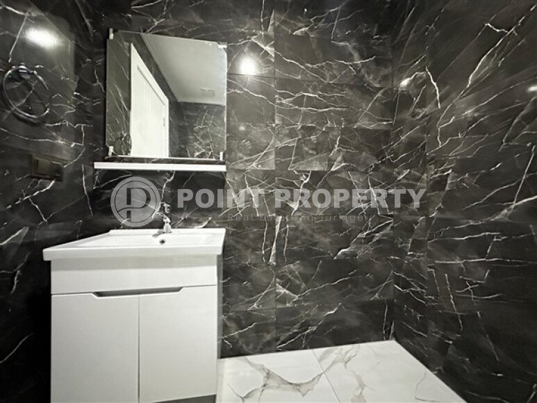 Modern apartment 55 m² in the center of Alanya with panoramic windows in a new complex-id-9597-photo-12